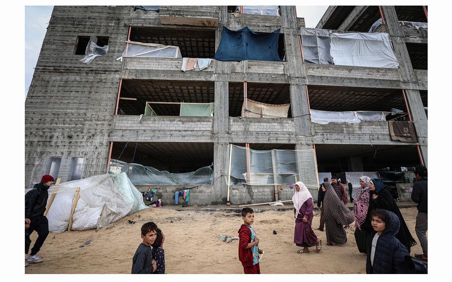 Palestinian families live in tents in the al-Mawasi area of Rafah in the Gaza Strip. .