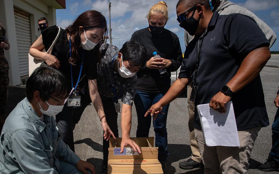 Japanese authorities collected samples of treated wastewater at Marine Corps Air Station Futenma, Okinawa, Japan, on July 19, 2021. 