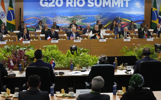 Leaders attend a meeting at the G20 Summit in Rio de Janeiro, Monday, Nov. 18, 2024.