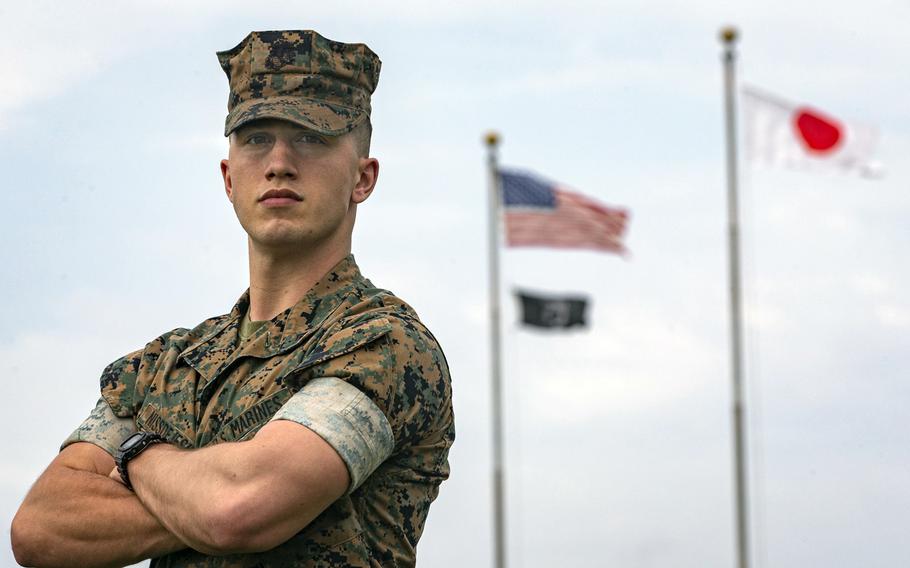 Cpl. Eric John Niss de Jesus, a military policeman with headquarters and support battalion, Marine Corps Installations Pacific, poses at Camp Foster, Okinawa, April 16, 2021.