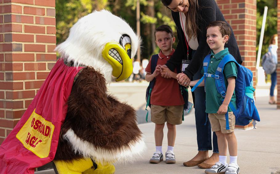 Students are greeted by the Crossroads Eagle mascot “Freedom” during a back-to-school celebration at the Crossroads Elementary School on Marine Corps Base Quantico, Va., Aug. 21, 2024. 