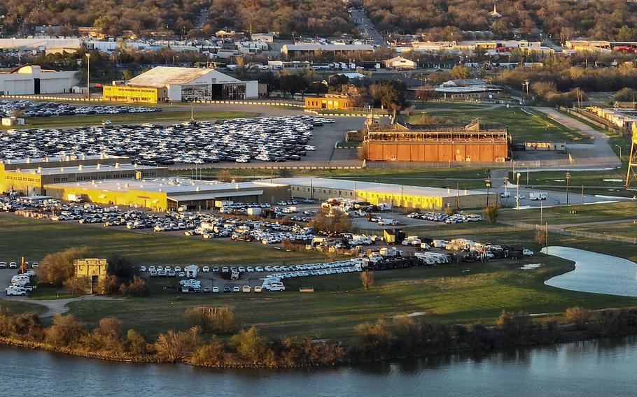 Automobiles fill the former ramp areas at Hensley Field in Dallas in December 2022.