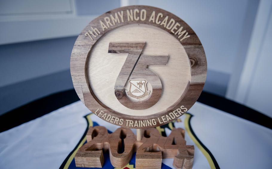 A decorative sign denoting the 7th Army NCO Academy’s 75th anniversary.