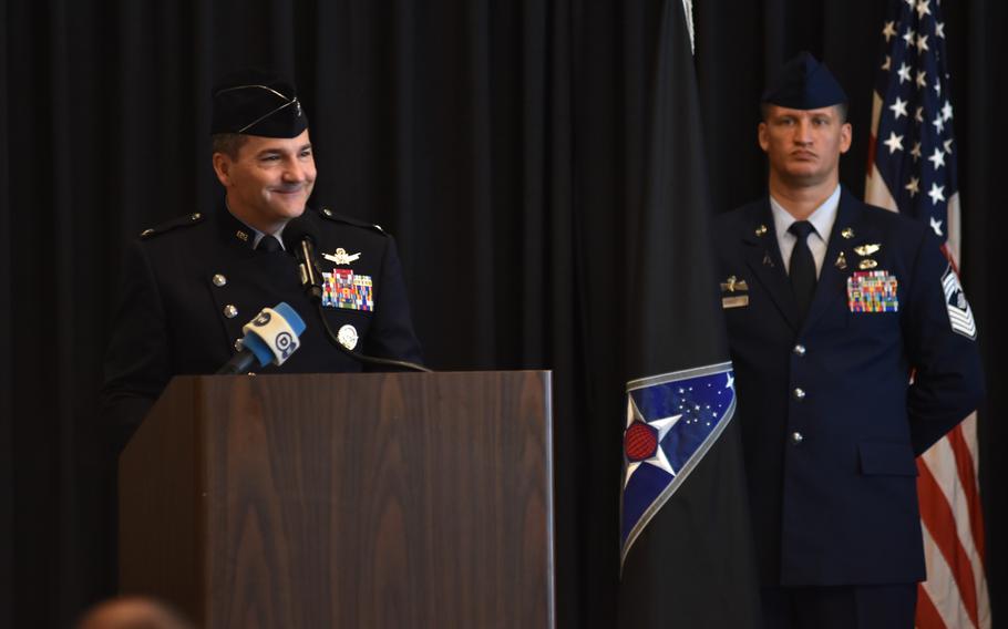 Col. Max Lantz II smiles during his farewell speech on Aug. 13, 2024, as the outgoing commander of U.S. Space Forces in Europe-Space Forces Africa. Lantz is retiring after leading the unit since its activation in December at Ramstein Air Base, Germany.