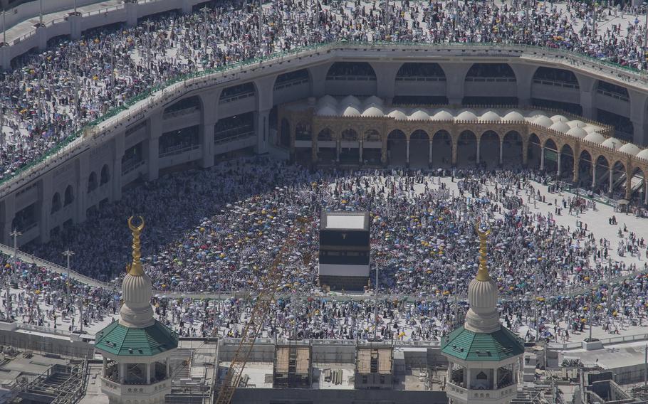 Muslim pilgrims circumambulate the Kaaba, the cubic building at the Grand Mosque, during the annual Hajj pilgrimage in Mecca, Saudi Arabia, Monday, June 17, 2024. 