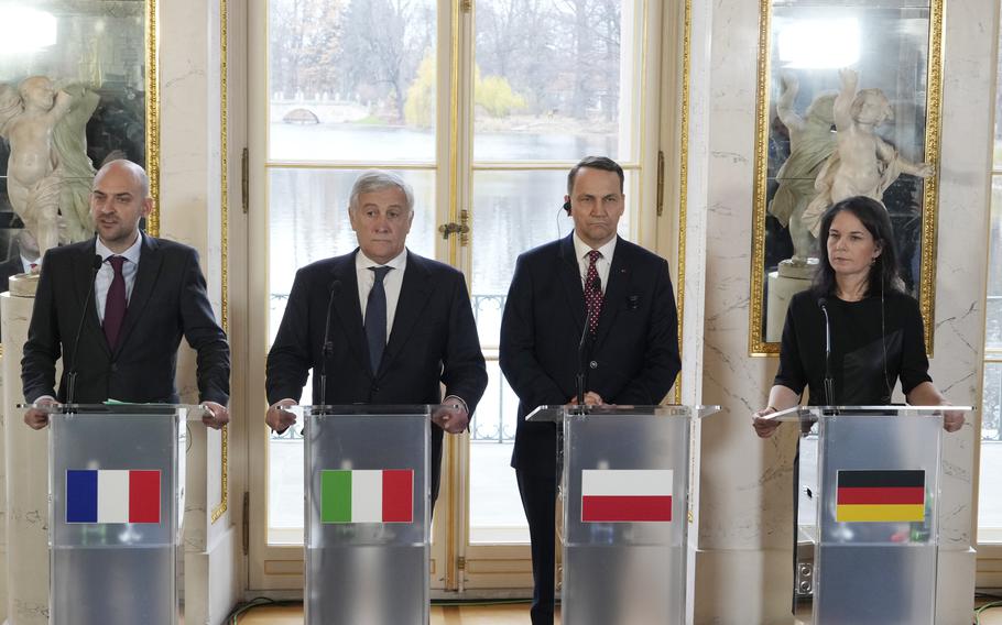 French Minister for Europe and Foreign Affairs Jean-Noel Barrot, left, Italian Foreign Minister Antonio Tajani, second left, Polish Foreign Minister Radoslaw Sikorski and German Foreign Minister Annalena Baerbock attend a press conference