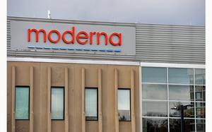 The Moderna logo is seen at the Moderna campus in Norwood, Massachusetts on December 2, 2020. (Joseph Prezioso/AFP via Getty Images/TNS)