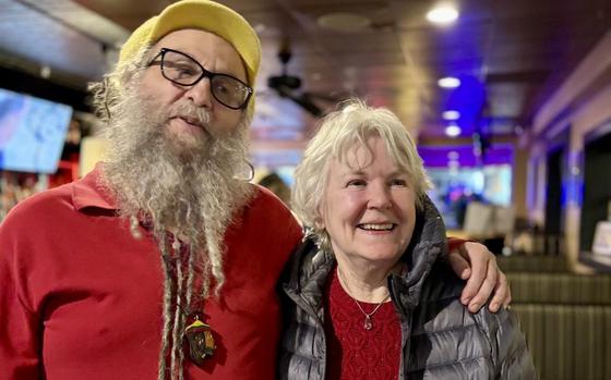 Andy Chertow and Diane Hinton, who last cut Chertow's hair in 1974, at his party Dec. 14 in Syracuse, N.Y. 