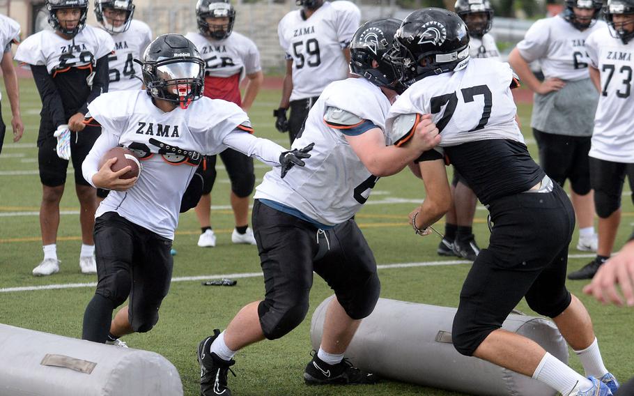 Zama returns four of five starting linemen and all its skills positions from a season ago, but must settle on a No. 1 quarterback.