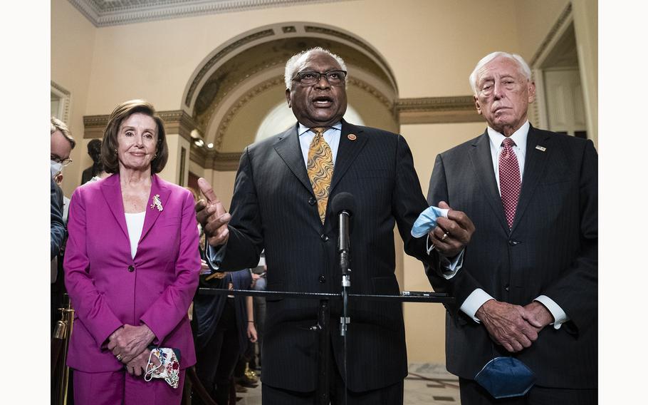 Reps. Nancy Pelosi, D-Calif., James E. Clyburn, D-S.C., and Steny H. Hoyer, D-Md., seen attending a briefing in November 2021, were at the top of Democratic leadership in the House for 17 years. 
