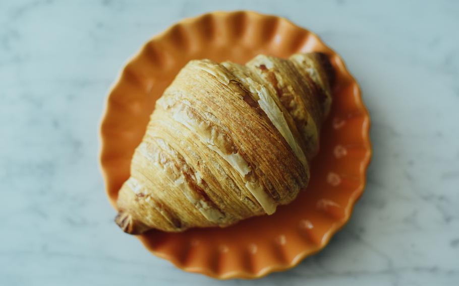 A plain croissant from Layers in Bahrain.