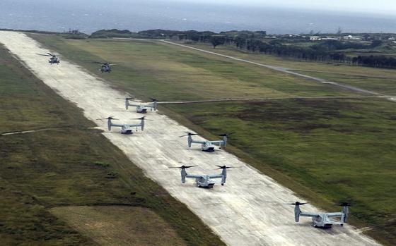 Marine Corps aircraft, including MV-22B Ospreys and CH-53E Super Stallions, prepare to depart Ie Shima, Okinawa, Oct. 31, 2015.