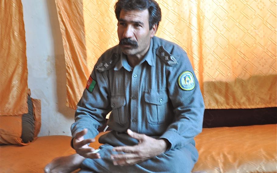 Pashtun Zarghun district police commander Fajil Ahmad Regiwal smiles during a conversation in his office on Feb. 10, 2010. U.S. forces mentoring the police in this district of the western Herat province attribute relative peace in the region to Regiwal’s leadership in fighting insurgents, crime and corruption.