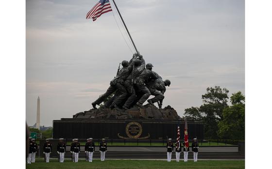 Marines with the United States Marine Corps Color Guard, Marine Barracks Washington, march onto the parade deck during a Sunset Parade at the Marine Corps War Memorial, Arlington, Va., July 23, 2024. The hosting official for the evening was Lieutenant General Bradford Gering, Deputy Commandant for Aviation, and the guest of honor was The Honorable Donald Norcross, United States Representative of New Jersey’s 1st Congressional District. (U.S. Marine Corps photo by Lance Cpl. Iyer P. Ramakrishna)