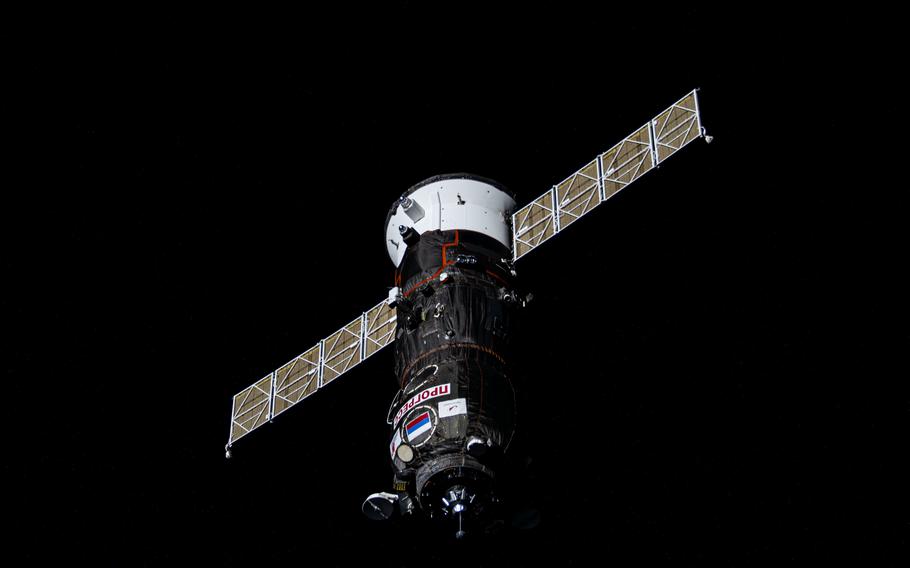 The International Space Station in the deep black of space.