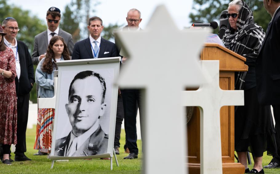 A photo of Army 1st Lt. Nathan Baskind is displayed at his burial ceremony June 23, 2024, at Normandy American Cemetery in Colleville-sur-Mer, France. Baskind fought in World War II and was initially buried in a mass grave with enemy German soldiers. 