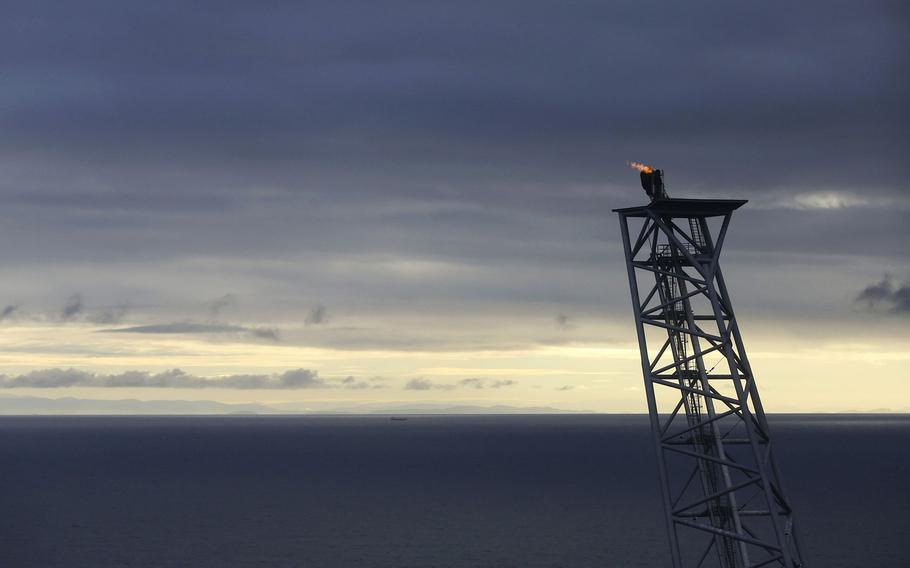 A gas flame burns on an offshore gas platform in the North Sea near Bergen, Norway.