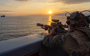 Marine Corps Sgt. Jesse McManigle, a scout sniper aboard the amphibious docking ship USS Green Bay, participates in an exercise in the Philippine Sea, Feb. 7, 2024. The Marine Corps says its newest sniper rifle is ready ahead of schedule. 