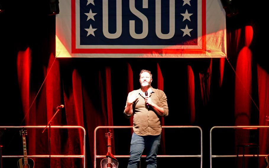 An entertainer performs during a USO show in Italy.