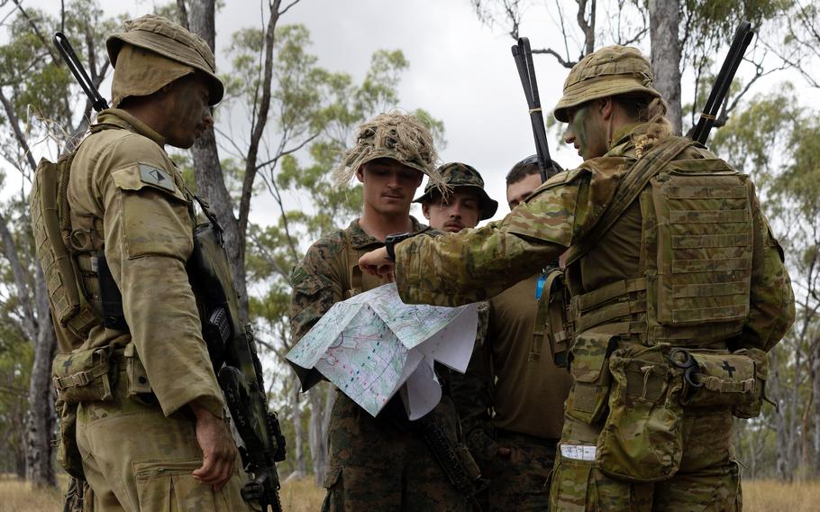 U.S. Marines and Australian troops plan movements during the Southern Jackaroo exercise at Townsville Field Training Area in Queensland, Australia, May 25, 2024.
