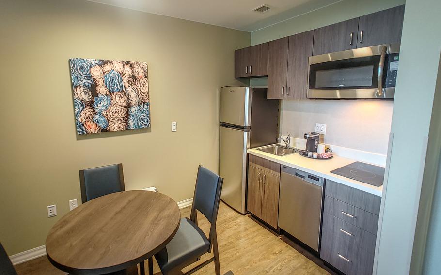 A small kitchen and dining table at the Camp Walker Lodge.