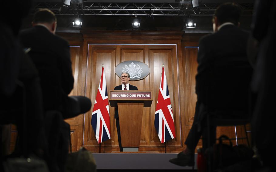 Britain’s Prime Minister Keir Starmer speaks at a press conference.