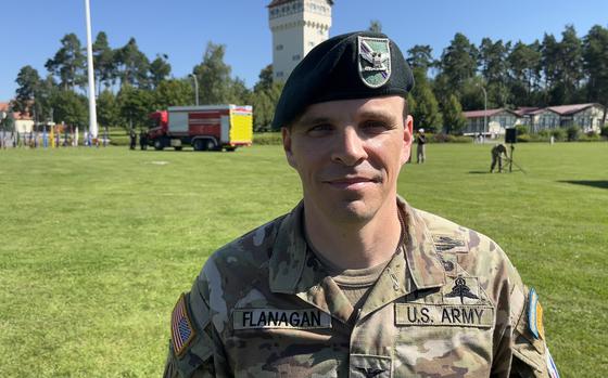 Army Col. Stephen Flanagan speaks to reporters Aug. 6, 2024, after taking command of U.S. Army Garrison Bavaria in a ceremony at Tower Barracks in Grafenwoehr, Germany.