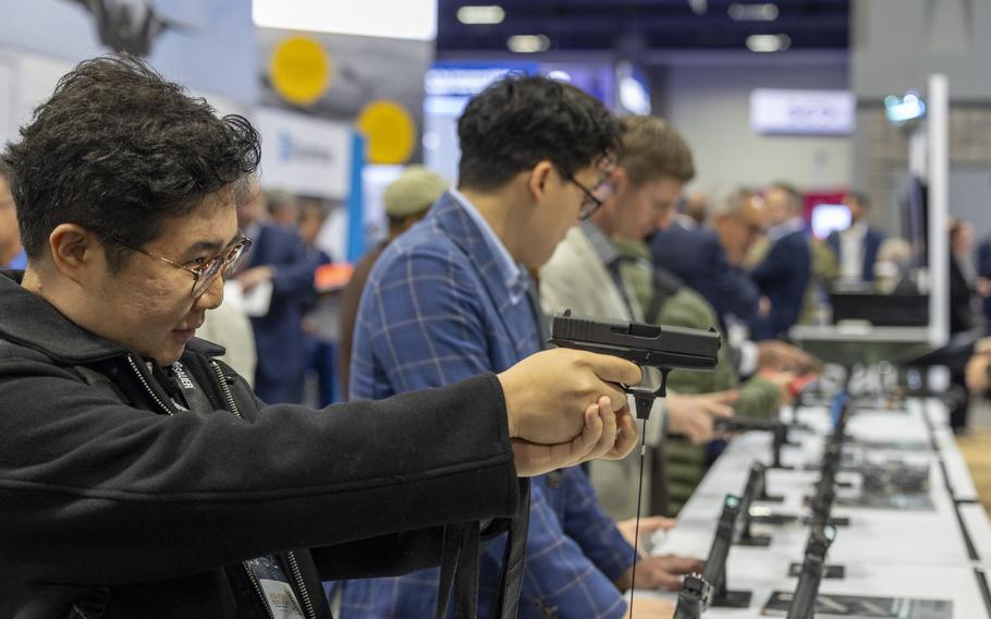 A participant sights a Glock