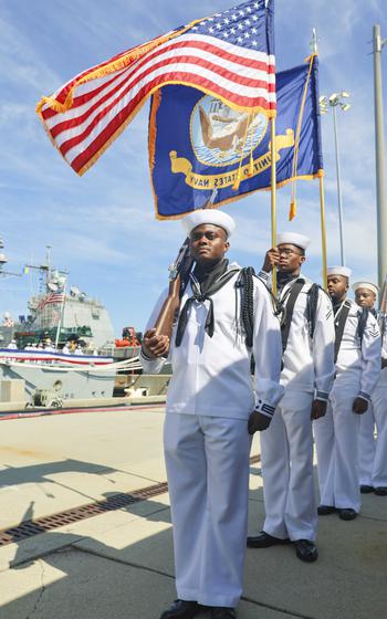 The Color guard marches during the decommissioning ceremony of the guided-missile cruiser USS Vicksburg (CG 69), June 28, 2024, in Norfolk, Va.