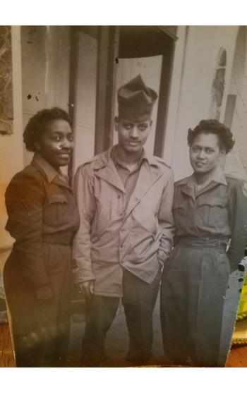 Romay Johnson Davis, right, with two fellow service members. 
