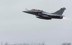 A French Rafale jet takes off.