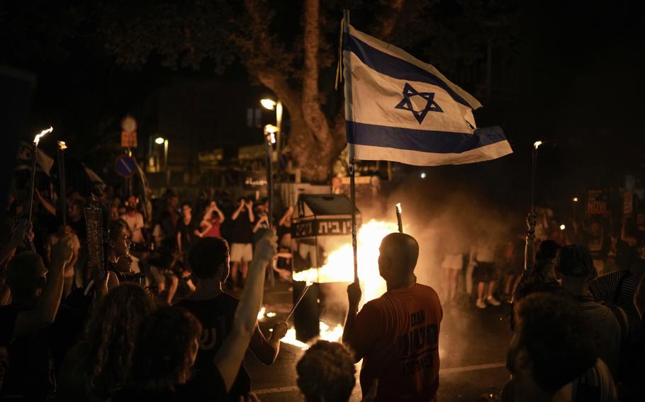 People protest against Israeli Prime Minister Benjamin Netanyahu's government and call for the release of hostages held in the Gaza Strip by the Hamas militant group, in Tel Aviv, Israel, Saturday, June 22, 2024.
