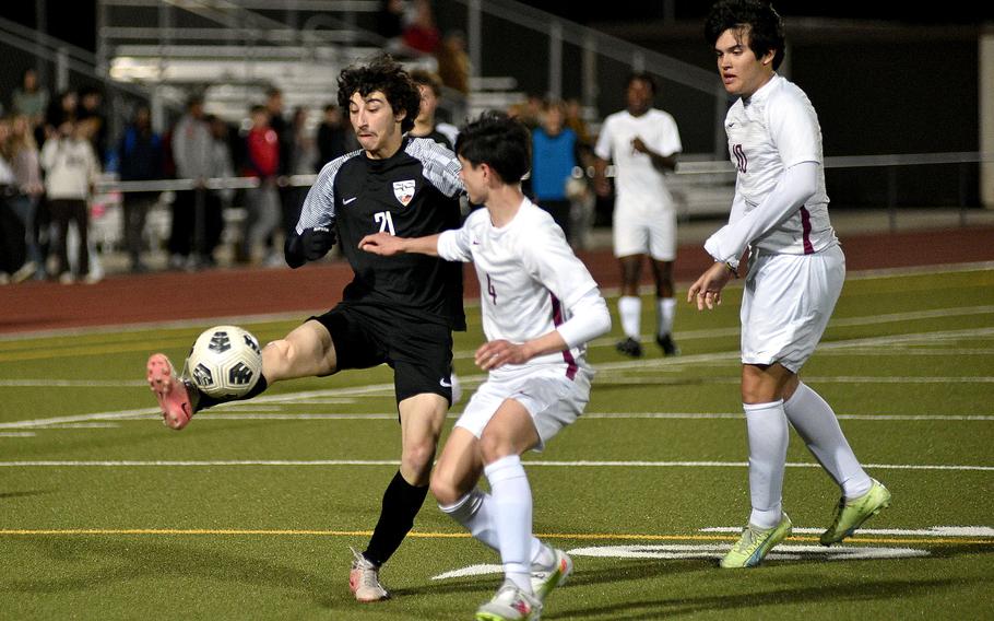 James Sheppard tries to keep control of the ball.