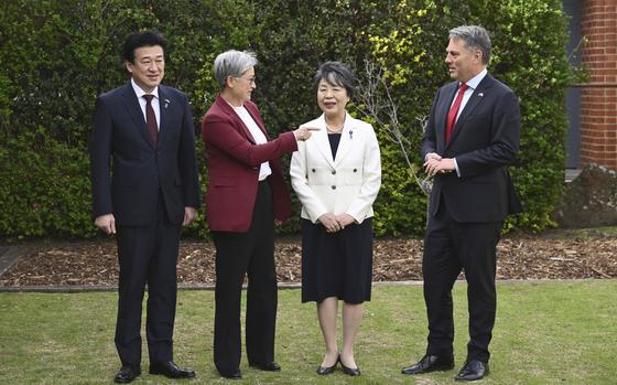 Japanese Defense Minister Minoru Kihara, left, Australian Foreign Minister Penny Wong, second left, Japanese Foreign Minister Yoko Kamikawa and Australian Defence Minister Richard Marles, right, pose for a photo in Queenscliff, Australia, Thursday, Sept. 5, 2024. (Joel Carrett/AAP Image via AP)