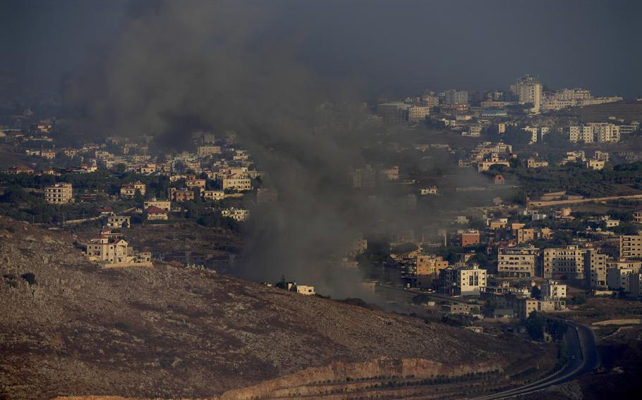 Smoke rises from an Israeli airstrike on Kfar Rouman village, as seen from Marjayoun town, south Lebanon, Monday, Sept. 23, 2024. 