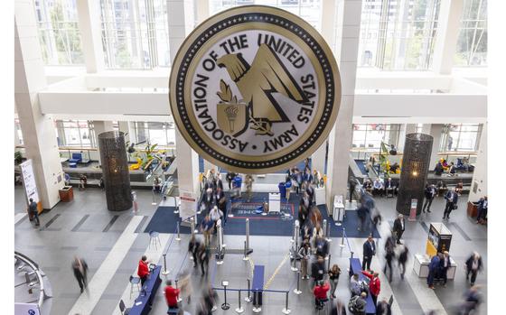 The AUSA seal is displayed over the entrance to the Walter E. Washington Convention Center during day two of the Association of the United States Army (AUSA) annual meeting, Tuesday, Oct. 15, 2024 in Washington. (Eric Kayne/Stars and Stripes)