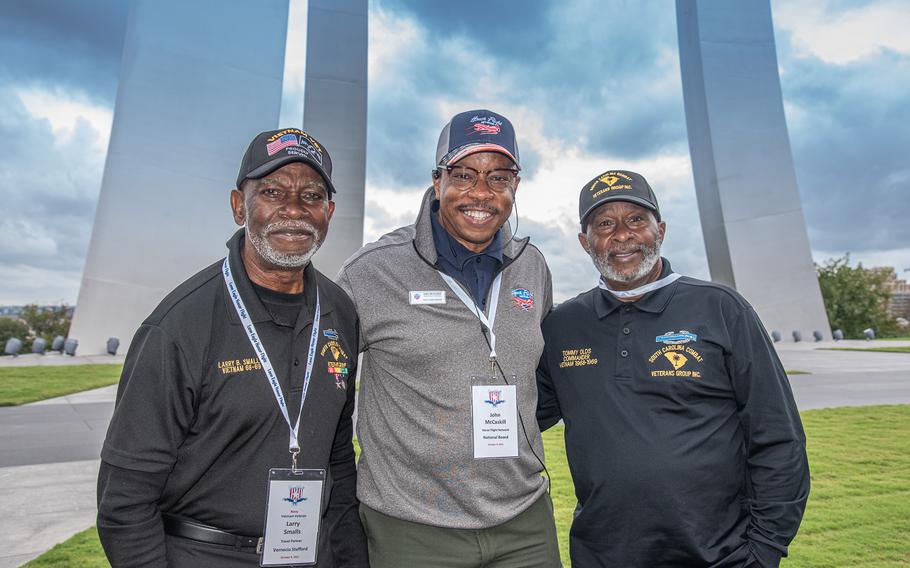 John W. McCaskill, a military historian and board member of the Honor Flight Network, is flanked by Tommy Olds and Larry Smalls, both Vietnam veterans, in this 2021 photo taken at the Air Force Memorial in Arlington, Va.