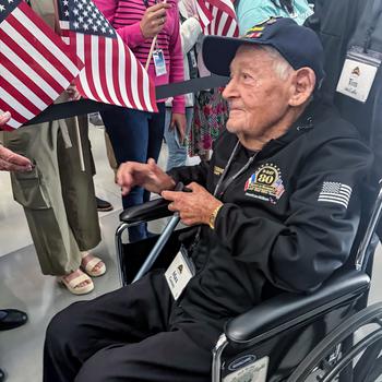 World War II veteran Max Gurney is cheered on Friday, May 31, 2024, before heading off to France for the 80th anniversary of the D-Day landings in Normandy. Gurney was a German born veteran who fought in the Army in Italy.