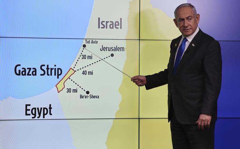 Benjamin Netanyahu points at spots on a map of Israel during a press conference in Jerusalem on Sept. 4, 2024.