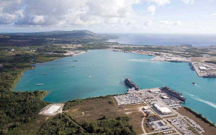 An aerial view of Naval Base Guam shows several vessels moored at Apra Harbor, March 15, 2018.