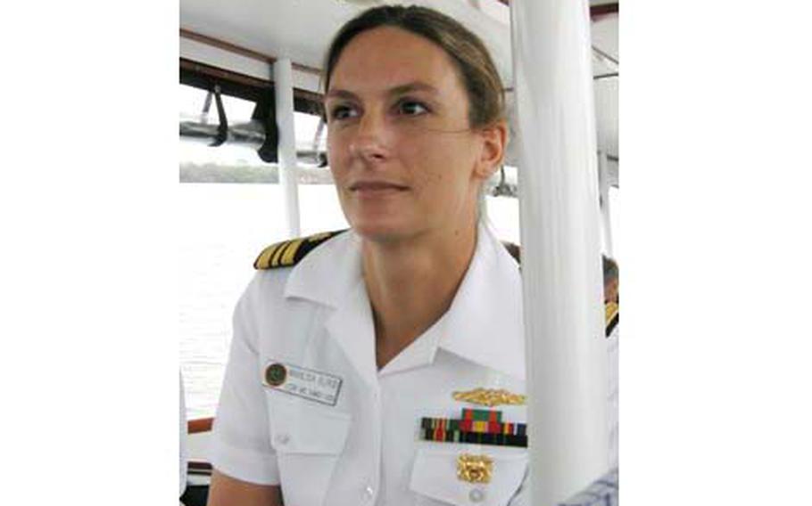 Lt. Cmdr. Marilisa Elrod, shown here in Hawaii recently, has a rare distinction: as a doctor and undersea medical officer, she has become submarine qualified in a service that excludes women as crewmembers. Elrod says it would take effort and changes but believes women can successfully serve on submarines.