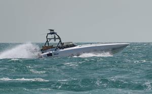 A MARTAC T-38 Devil Ray unmanned surface vehicle operates in the Arabian Gulf, Oct. 26, 2023. According to a military official, the U.S. Navy has changed the focus of its Middle East drone boat effort after not reaching its goal of assembling a fleet of 100 unmanned surface vessels.