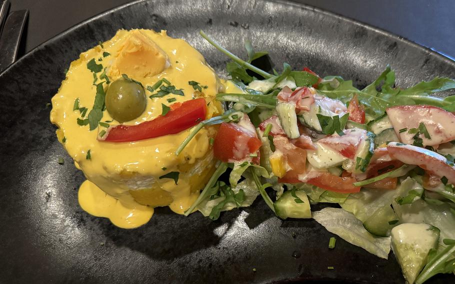 A starter at Mi Peru in Darmstadt, Germany is this causa rellena, a layered potato salad with a chicken-mayonnaise center. Garnished with a small salad, it was quite delicious and rather filling as a starter.