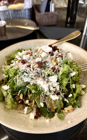 The Botanica salad was a highlight of the experience at Melenzane in Manama, Bahrain. It includes kale and baby spinach with cranberries, walnuts, sunflower seeds and grapes, with a passion fruit and pomegranate dressing. The salad also features goat cheese crumbled atop shreds of crispy phyllo.