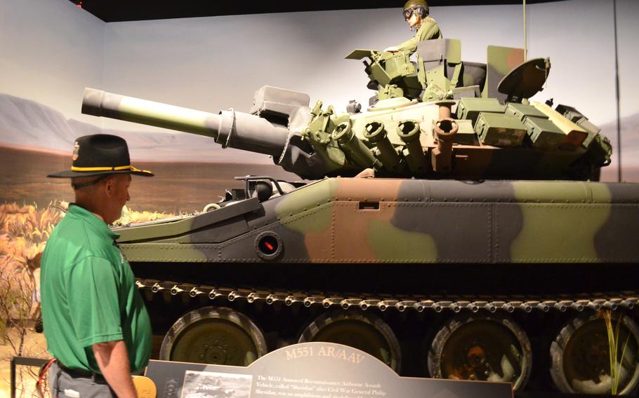 Army veteran Robb Ochsner reads the plaque on a M-551 Sheridan light tank at the National Mounted Warrior Museum.