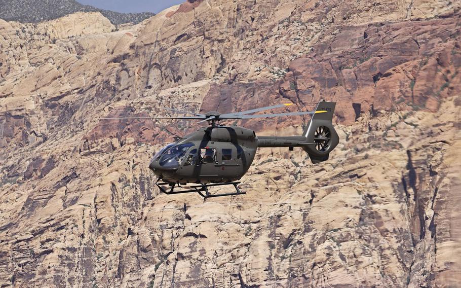 A UH-72B Lakota helicopter that belongs to the Nevada Army Guard flies over Red Rock Canyon on Tuesday, May 16, 2023. 