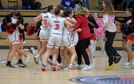 The AOSR Falcons celebrate their girls Division II title after defeating Vicenza 27-25 on a last-second basket at the DODEA-Europe Feb. 15, 2025.