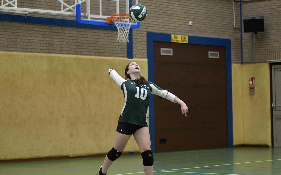 AFNORTH's Avery Sweeney serves during the Lions' Oct. 7, 2023, match against Ansbach at AFNORTH International School in Brunssum, Netherlands.