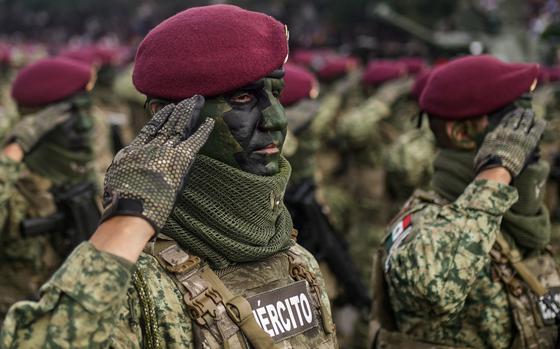 FILE - A soldier participates in the Independence Day military parade in the Zocalo, Mexico City's main square, Sept. 16, 2024. (AP Photo/Felix Marquez File)