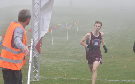 Frankfurt International’s Seth Leishman approaches the finish line at the 2024 DODEA European Cross Country Championships on Saturday, Oct. 26, 2024. Leishman won the boys’ race in 16:59.49 to win his first individual title in his fourth year running at the Rolling Hills Golf Course in Baumholder, Germany.
